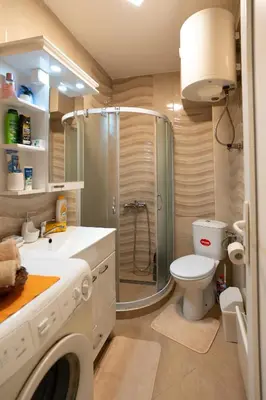 a bathroom with a shower and a toilet and a sink at CVETIĆ apartman in Zaječar