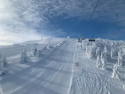 a ski lift going down a snow covered slope at Z3 Studio in Kopaonik