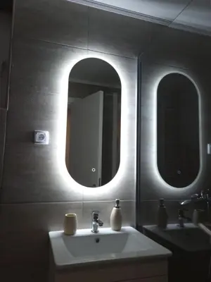 a bathroom with a sink and a mirror at Hera Kopaonik in Kopaonik
