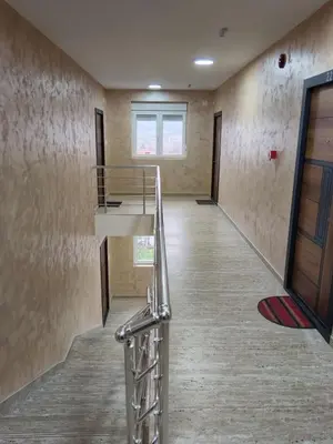 a hallway with a staircase in a building at Četiri dragulja in Soko Banja