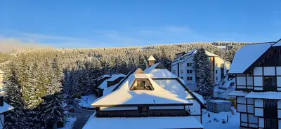 an aerial view of a building covered in snow at Vila Breg Kopaonik Centar in Kopaonik