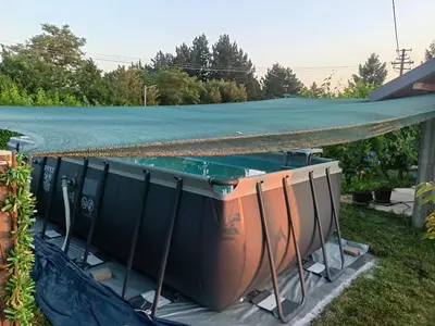 a swimming pool with a roof on top at Apartman vikend kuca Hs in Pirot