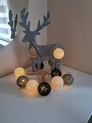 a group of lights sitting on top of a table at Apartman Dream M Zaječar in Zaječar