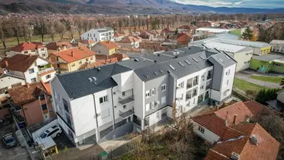 an aerial view of a city with buildings at Apartman Jovanović in Pirot