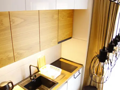 a small kitchen with a sink and a counter top at studio apartman Najdanović CENTAR in Vrnjačka Banja