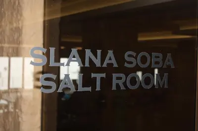 a sign on a glass door of a sale room at Silvani Kop NLux67, Milmari Apartments & Spa in Kopaonik