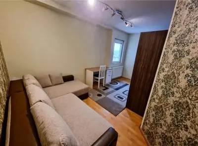 a living room with a couch and a table at Apartman Teodora in Jagodina