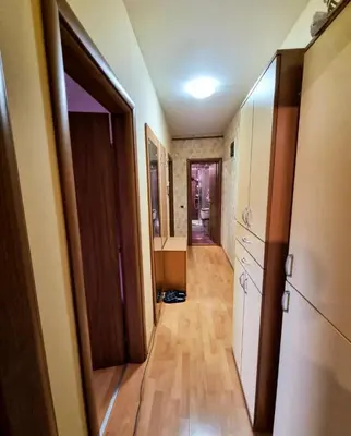 a hallway of a house with an open door at Apartman Teodora in Jagodina