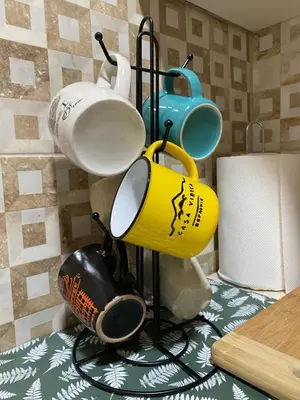 a group of pots and pans hanging on a counter at Casa Vidica in Kopaonik