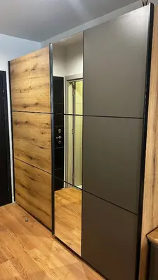 a large sliding glass door with a mirror in a room at Bela Reka C308 in Brzeće