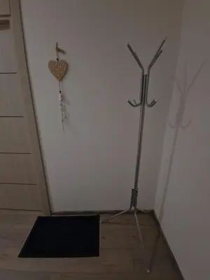 a room with a heart and a cross on the wall at La pera Kruševac in Kruševac