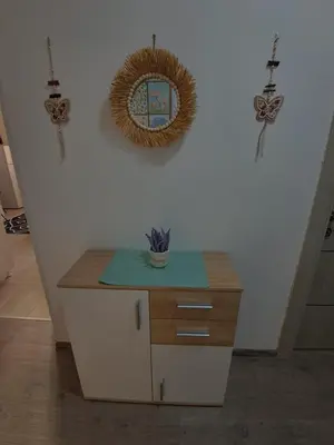 a room with a counter and a mirror on the wall at La pera Kruševac in Kruševac