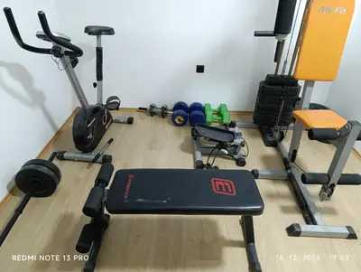 a room with a gym with several exercise equipment at Garfield Family Studio 2 in Soko Banja