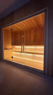 a large window in a room with wooden walls at NORD VISTA Premium Alpine and SPA Experience in Kopaonik