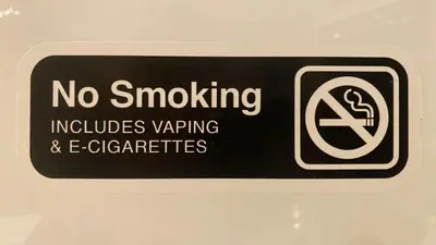a sign that says no smoking includes warnings and cigarettes at Konaci Koznik Porodični in Kopaonik