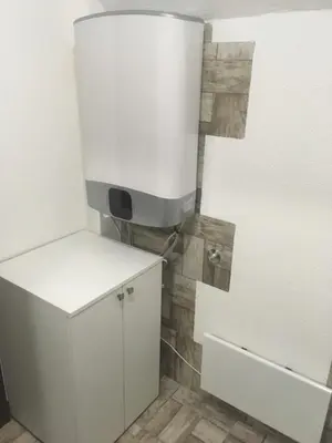 a bathroom with a white toilet in a room at Vila Krnjević Jastrebac in Buci
