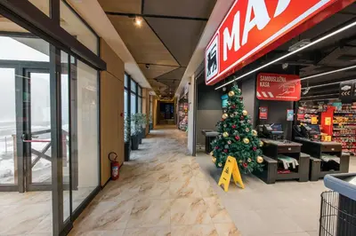 a christmas tree in the aisle of a kmart store at Apartmani Jovičić Kopaonik in Kopaonik