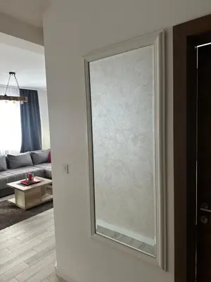 a sliding glass door in a living room at Vidik Residence A23 in Kopaonik