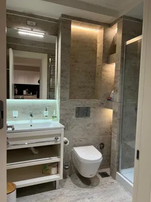 a bathroom with a toilet and a sink and a shower at Zepterme 509 in Vrnjačka Banja