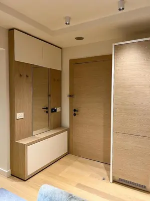 a room with a closet with wooden doors at Zepterme 509 in Vrnjačka Banja