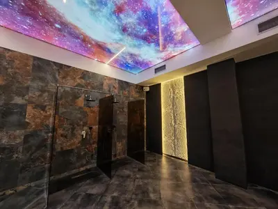 a room with a large painting on the ceiling at Apartman Aska - Residence Hill in Kopaonik
