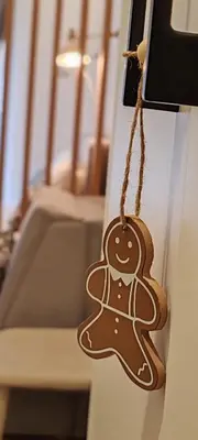 a gingerbread man ornament hanging on a door at Apartman Aska - Residence Hill in Kopaonik
