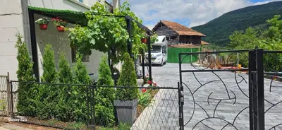 a building with plants on the side of it at Temački amanet in Pirot