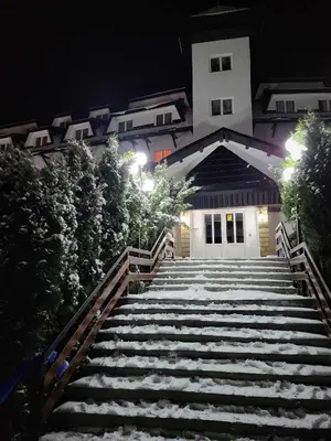 a set of stairs leading to a building at night at Studio Bele Staze Central in Brzeće