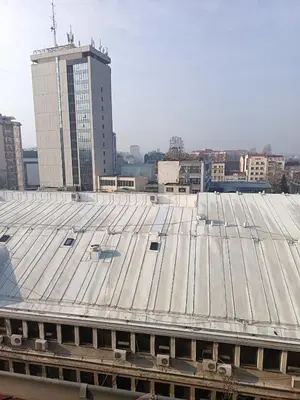 an empty roof of a building in a city at Niš,centar udobnosti in Niš