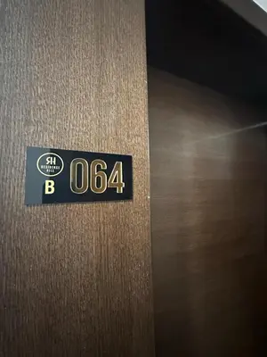 a close up of a door with a sign on it at Apartman B64 Residence Hill Kopaonik in Kopaonik