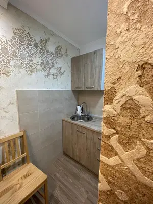a kitchen with a sink and a counter top at Apartman 911 in Soko Banja