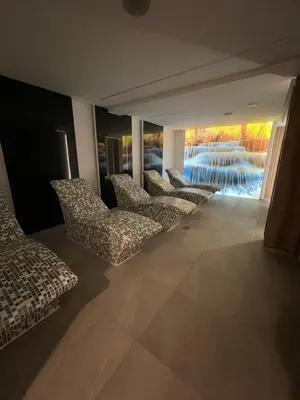 a row of chairs in a room with a view at President Kop A104 in Kopaonik