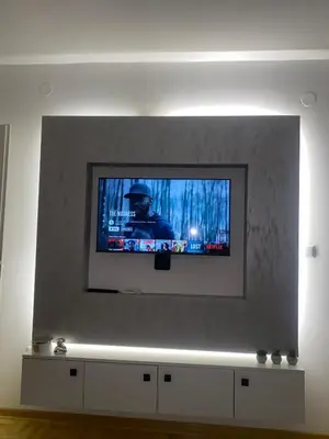 a flat screen tv sitting on top of a wall at Apartman Filip in Kruševac