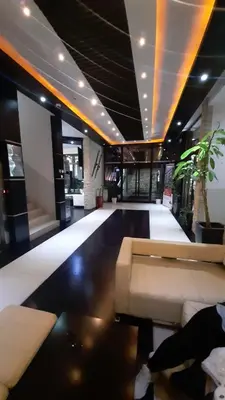 a living room with a couch and a table at Apartman Milovan in Kopaonik