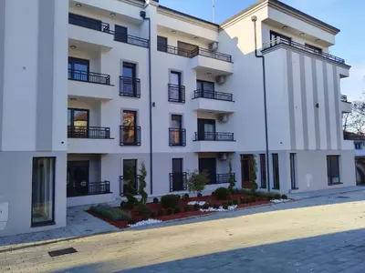 a large white building with windows and balconies at MSapartman in Vrnjačka Banja