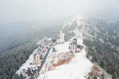 an aerial view of a ski resort in the snow at Ski2Door Apartment - Sunčani Breg, 50m from Ski Slope in Kopaonik