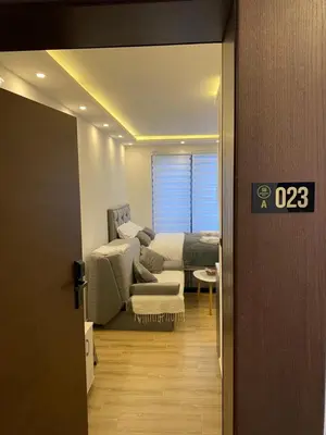 a room with a couch and a living room at Residence Hill , apartman Stefan A023 in Kopaonik