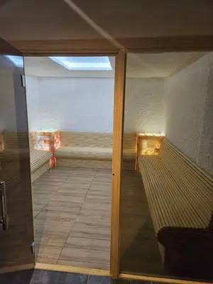 a view of a room with a glass door at Residence Hill , apartman Stefan A023 in Kopaonik