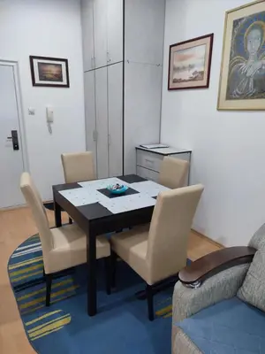 a dining room with a table and chairs at Smeštaj Vesna in Soko Banja