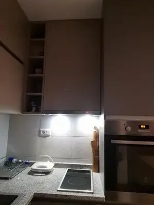a kitchen with a stove and a counter top at Janković in Vranje