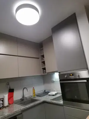 a kitchen with a sink and a stove top oven at Janković in Vranje