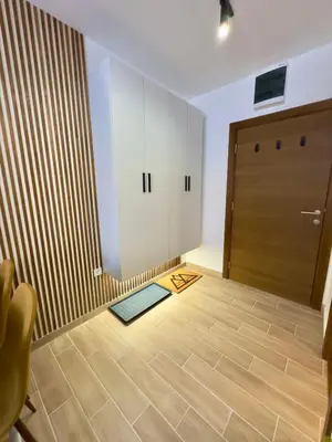 a room with a door and a mat on the floor at Coco Kop studio in Kopaonik