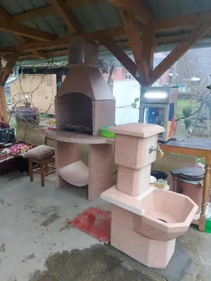 an outdoor brick oven in a building at Seosko turisticko domacinstvo Milanovic in Žuč