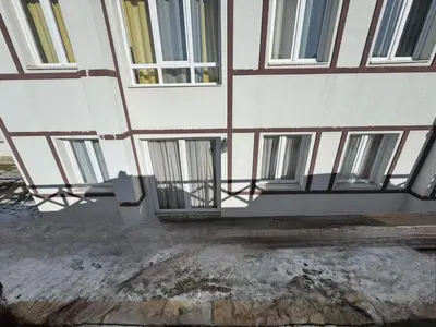 a building with windows on the side of it at Kraljevi Cardaci SPA Aartment 1027 für 6 Personen in Kopaonik