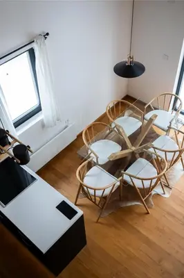 a group of chairs and a table in a room at Gorska Vila in Kopaonik