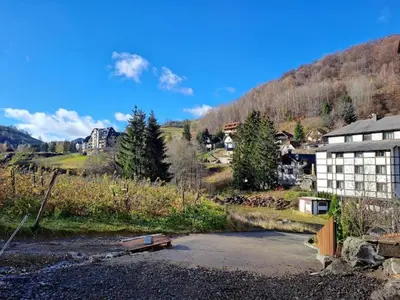 a village with a building and a mountain at Eli's APARTMENT 31 in Brzeće