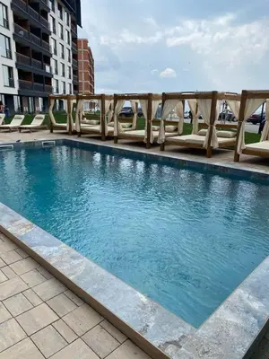 a swimming pool on the roof of a building at Residence Hill Chill on Kop Apartment in Kopaonik