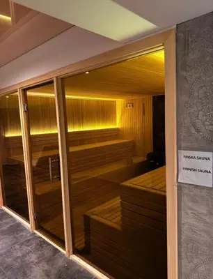 a sauna in a building with a sign on it at Residence Hill Chill on Kop Apartment in Kopaonik
