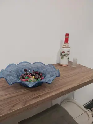 a table with a plate of food on top of it at Bella Winterhouse Kopaonik in Kopaonik