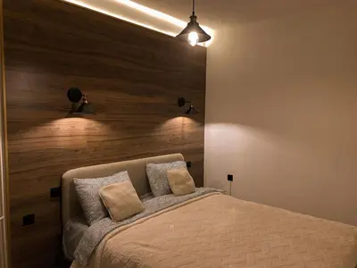 a bedroom with a bed with two pillows on it at Bagi Apartmani in Raška